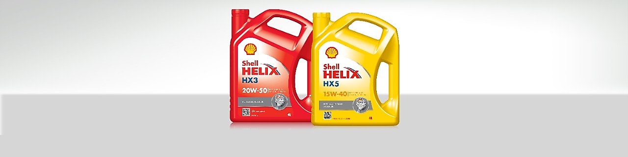 Dos embalajes de Shell Helix – una roja y otra amarilla