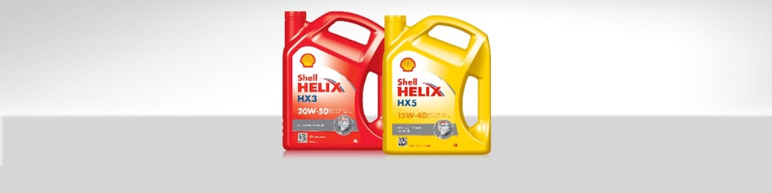 Dos embalajes de Shell Helix – una roja y otra amarilla